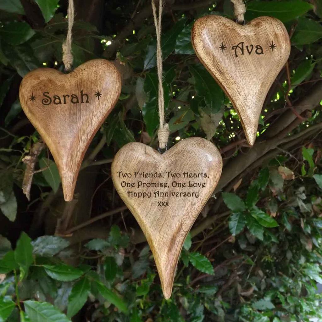 Personalised set of wooden hanging hearts in solid wood - A unique Anniversary Gift